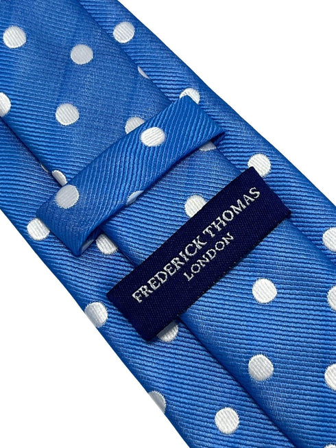 Medium electric blue tie with white polka spots